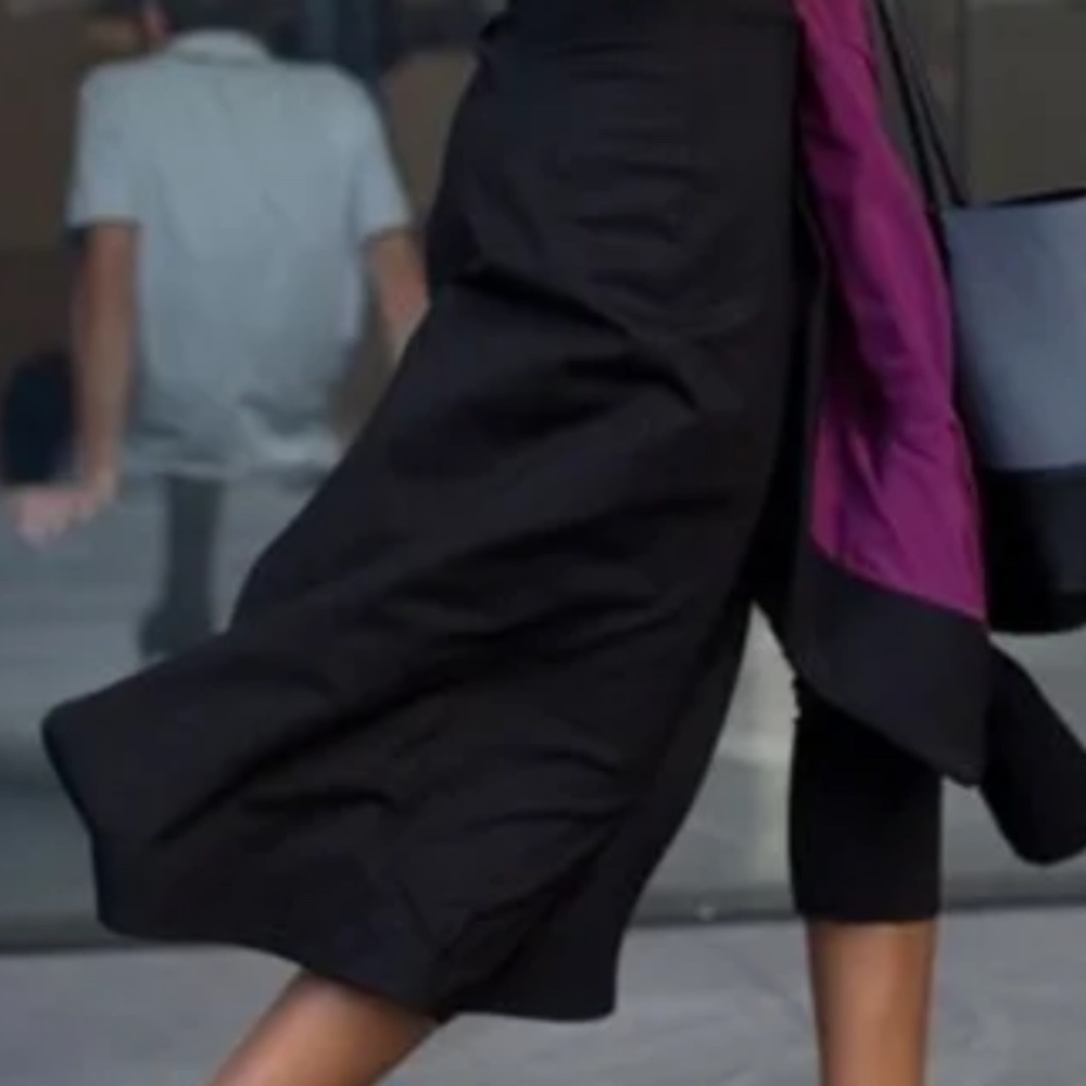 Beta brand black slit skirt with pants underneath. Worn once